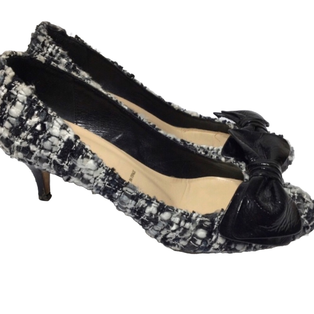 Butter houndstooth patent bow heels. Size 7.